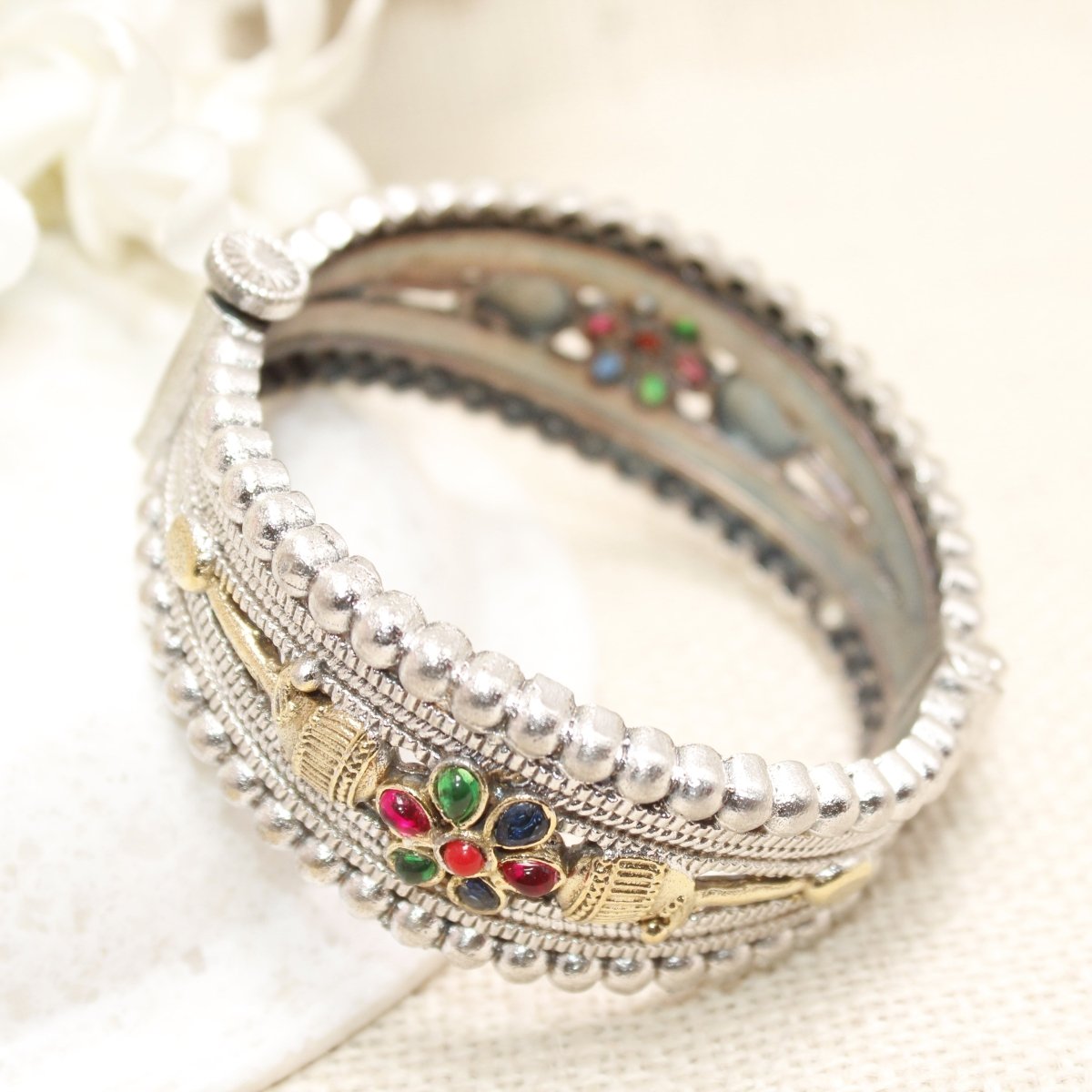 CHANDINI SILVER REPLICA DUAL - TONE STONE FLOWER KADA - kada