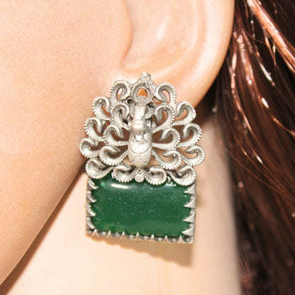 SILVER LOOK ALIKE DANCING PEACOCK STONE STUD-GREEN -EARRING