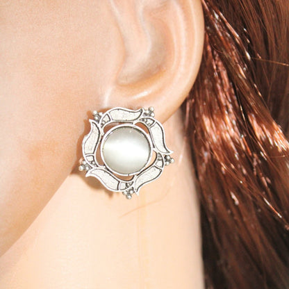 SILVER LOOK ALIKE ROUNDK STONE STUD-GREY -EARRING